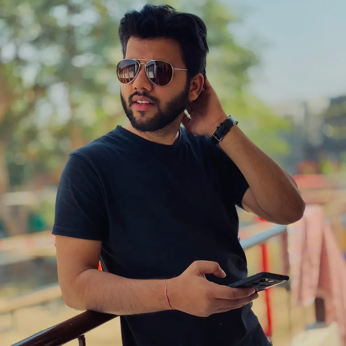 Rohit Jain in black clothing and sunglasses outdoors
